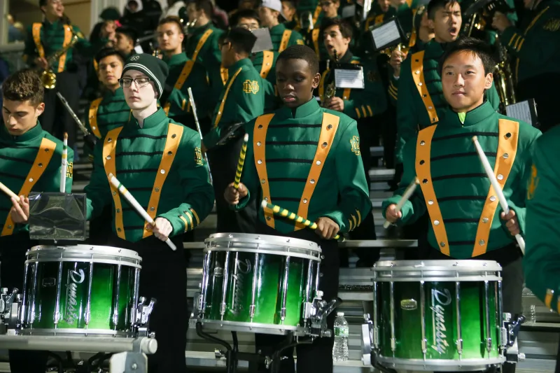 Marching Band The marching band performs half time shows at all of Notre Dame’s Home Football Games as well as the Thanksgiving Day Green Bowl in Hamden, and marches in our local annual Columbus Day, St. Patrick’s Day, and Memorial Day Parades. 