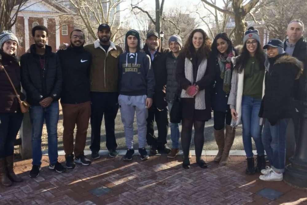 "Breaking Bread and Barriers" Project  Lucy Abbott, Michael Abbott ‘95, Andrew Buckholz ‘20,and Michael Celentano ‘86 teamed up with the Muslim Student Association at Yale in their "Breaking Bread and Barriers" project. On Saturday they prepared 80 bagged lunches for the homeless community and then passed them out on the New Haven Green and surrounding areas. 
