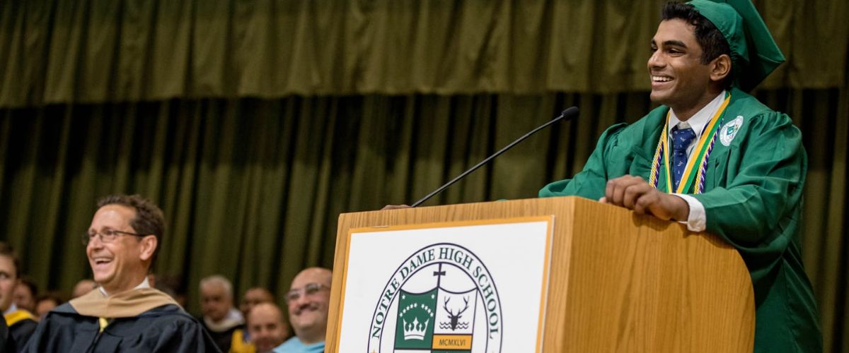 student speaking at graduation